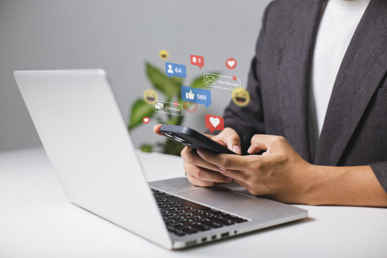 Man using laptop to work about live chat and social media market