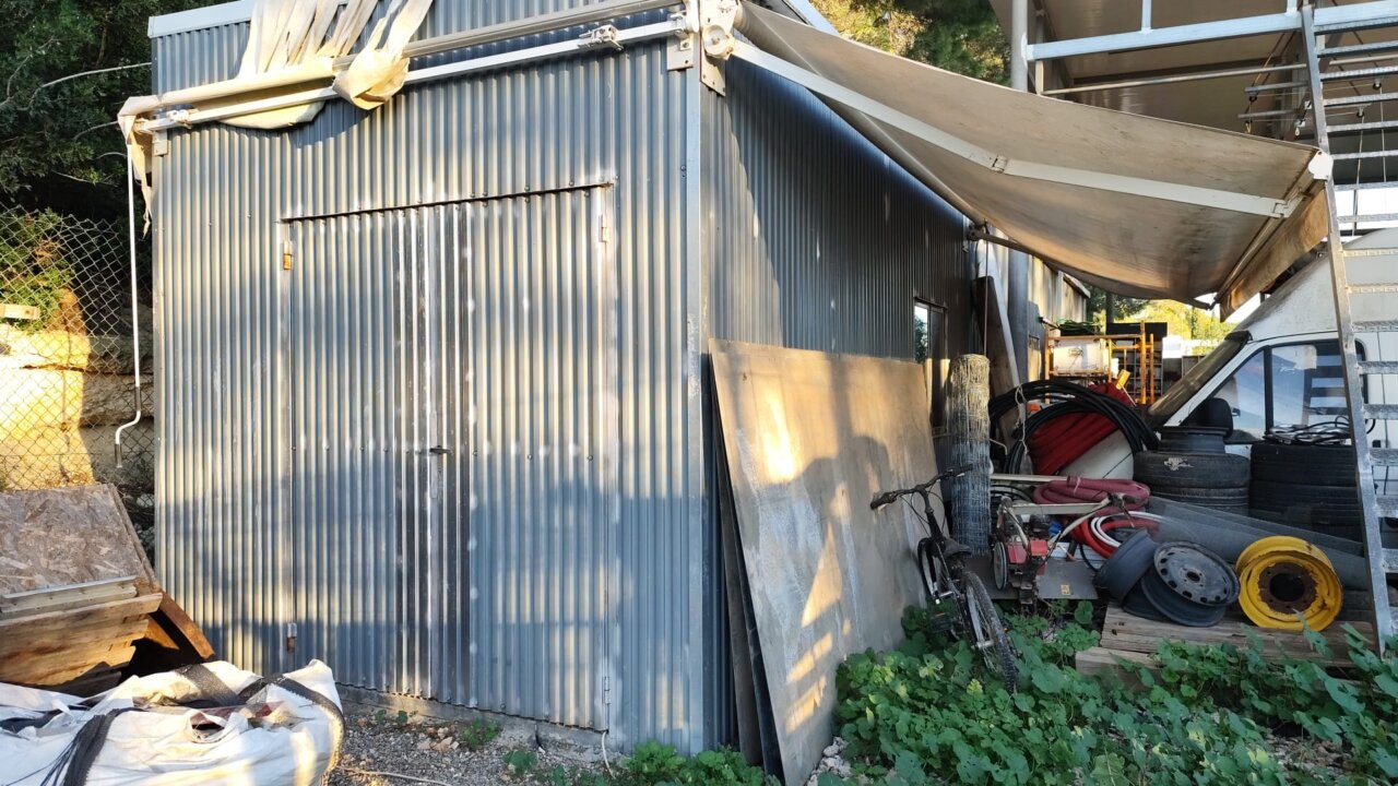 Image of the warehouse located outside Laura's house, in Can Guasch.  