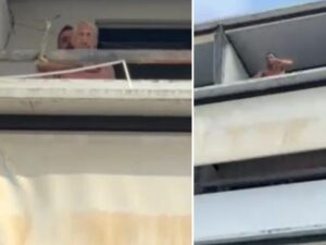 El DJ italiano amenaza a su vecino con un cuchillo. (Captura de video de Il Corriere della Sera)