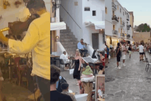Im&aacute;genes de un violinista y un grupo de capoeira en Dalt Vila sin autorizaci&oacute;n.