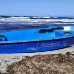 Barco de migrantes varado en la playa de Migjorn, Formentera