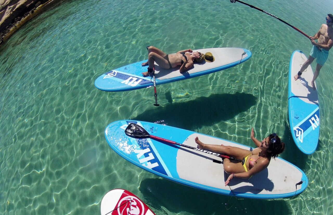 Excursi&oacute;n en barco con paddle surf y esn&oacute;rquel