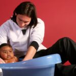 Lionel Messi y Lamine Yamal en una campaña solidaria de 2007