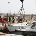 Sant Antoni saca del agua una barca abandonada y pasará la factura al dueño
