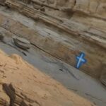 Denuncian pintadas y basura en una de las calas m&aacute;s bonitas de Ibiza